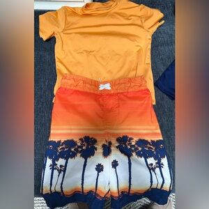 Lot of 5 boys swim shorts size 8 and 3 swim shirts